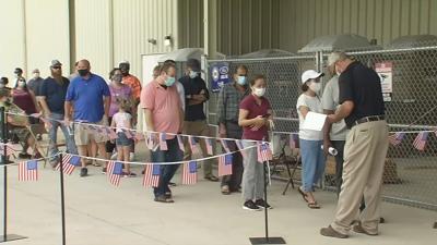 Line to receive in-person unemployment assistance in Louisville on Monday, Aug. 3, 2020