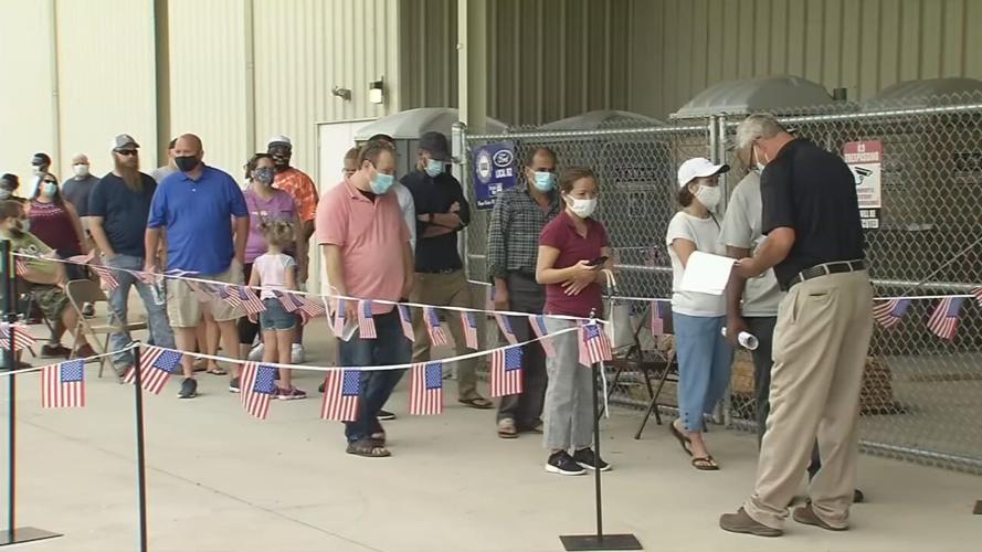 Line to receive in-person unemployment assistance in Louisville on Monday, Aug. 3, 2020