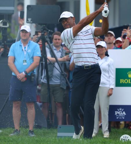 Tiger Woods hits on 13th hole.JPG