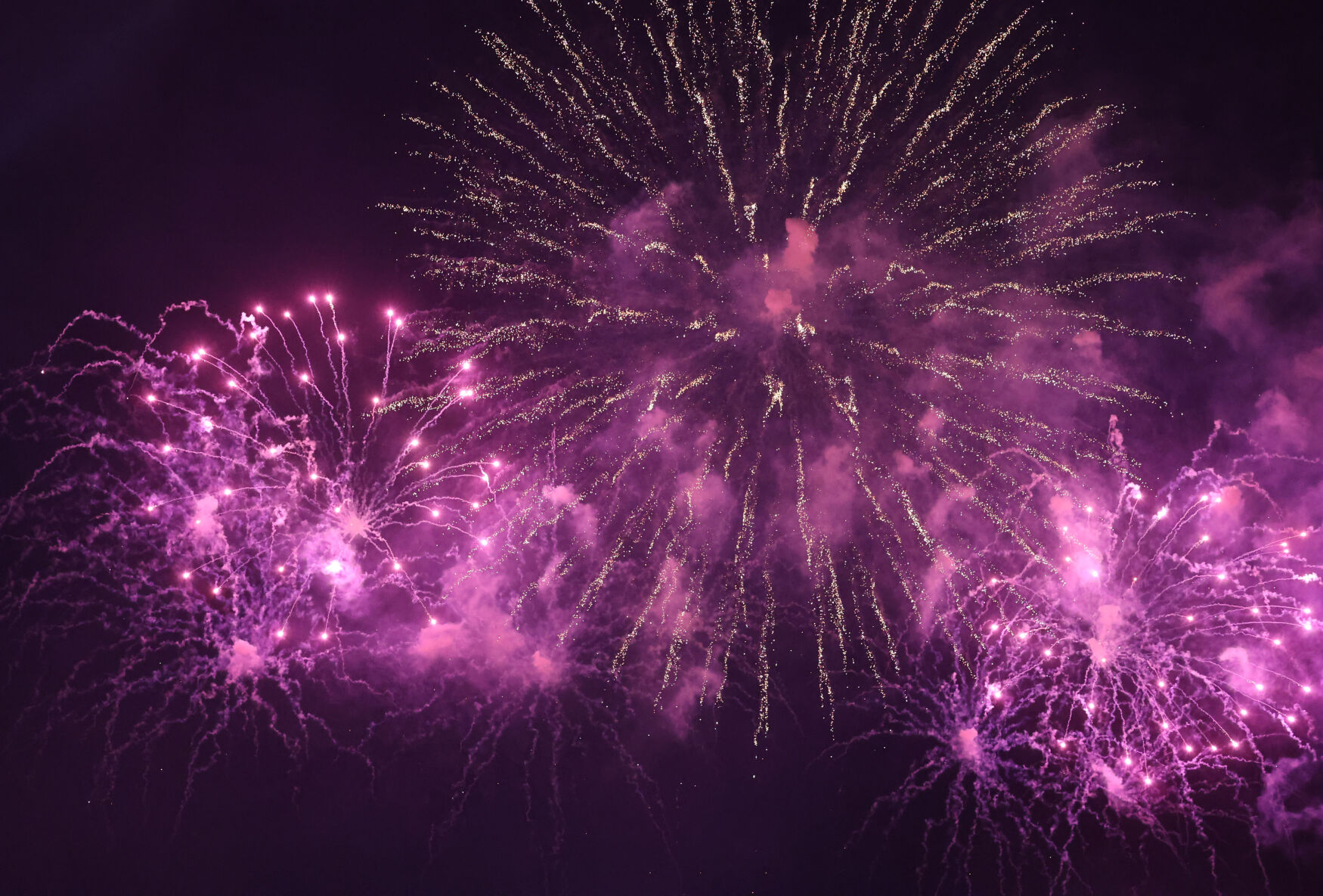 Pinkish fireworks explode.JPG