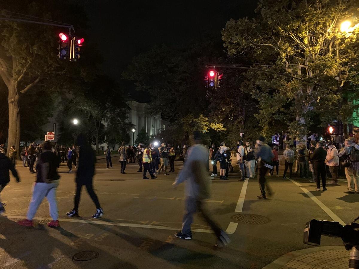 Protesters leave First Unitarian Church on 9/24/20