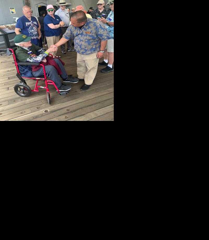 Faughn shaking hands