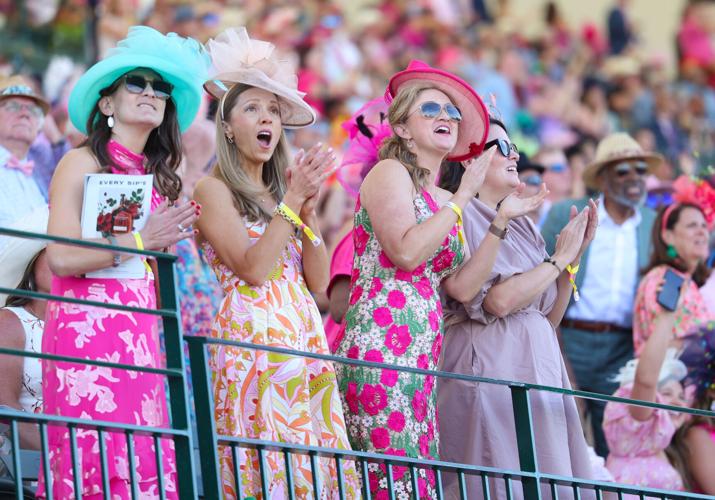 Women cheer during race at Oaks.JPG