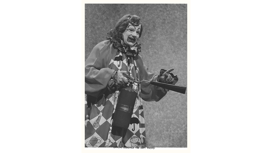 Presto the Magic Clown with fire extinguisher