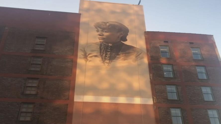 Henrietta Helm mural in downtown Louisville.jpeg