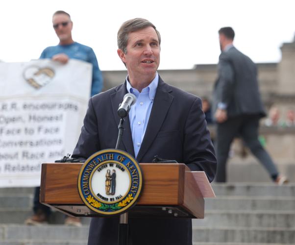Gov. Andy Beshear speaks to crowd.JPG