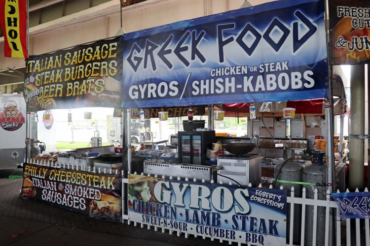 Crews set up booths along the Ohio River one day before Thunder Over Louisville 2023