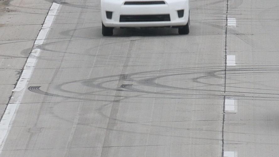 Black rubber tire marks on I-264 near Muhammad Ali International Airport