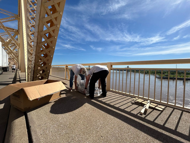 Zambelli crews place fireworks on Clark Memorial Bridge