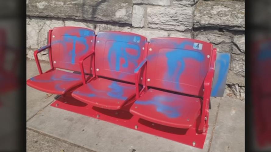 MORE GRAFFTI ON UL STADIUM BUS STOP SEATS 4VO.transfer_frame_762 red and blue.jpg