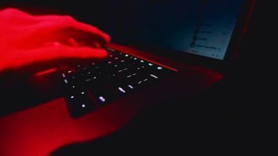 Typing on keyboard in darkness (generic) hacking.jpg