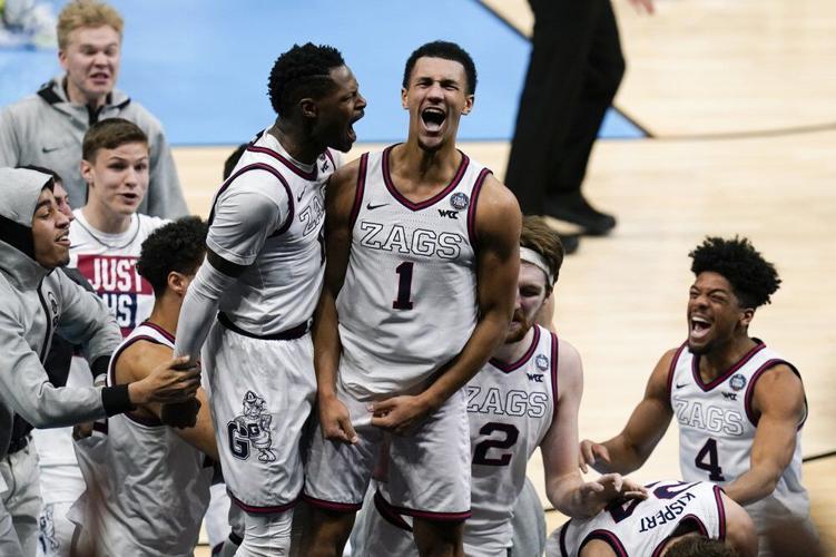 Gonzaga guard Jalen Suggs (1) celebrates making the game winning basket