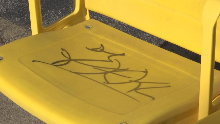 MORE GRAFFTI ON UL STADIUM BUS STOP SEATS 4VO.transfer_frame_330 close-up.jpg