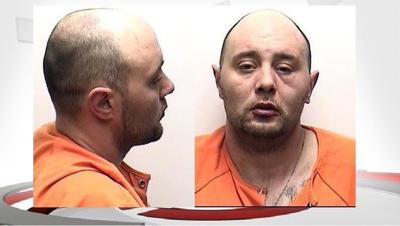 Man charged in killing of Jeffersonville woman found hidden under stairs in home