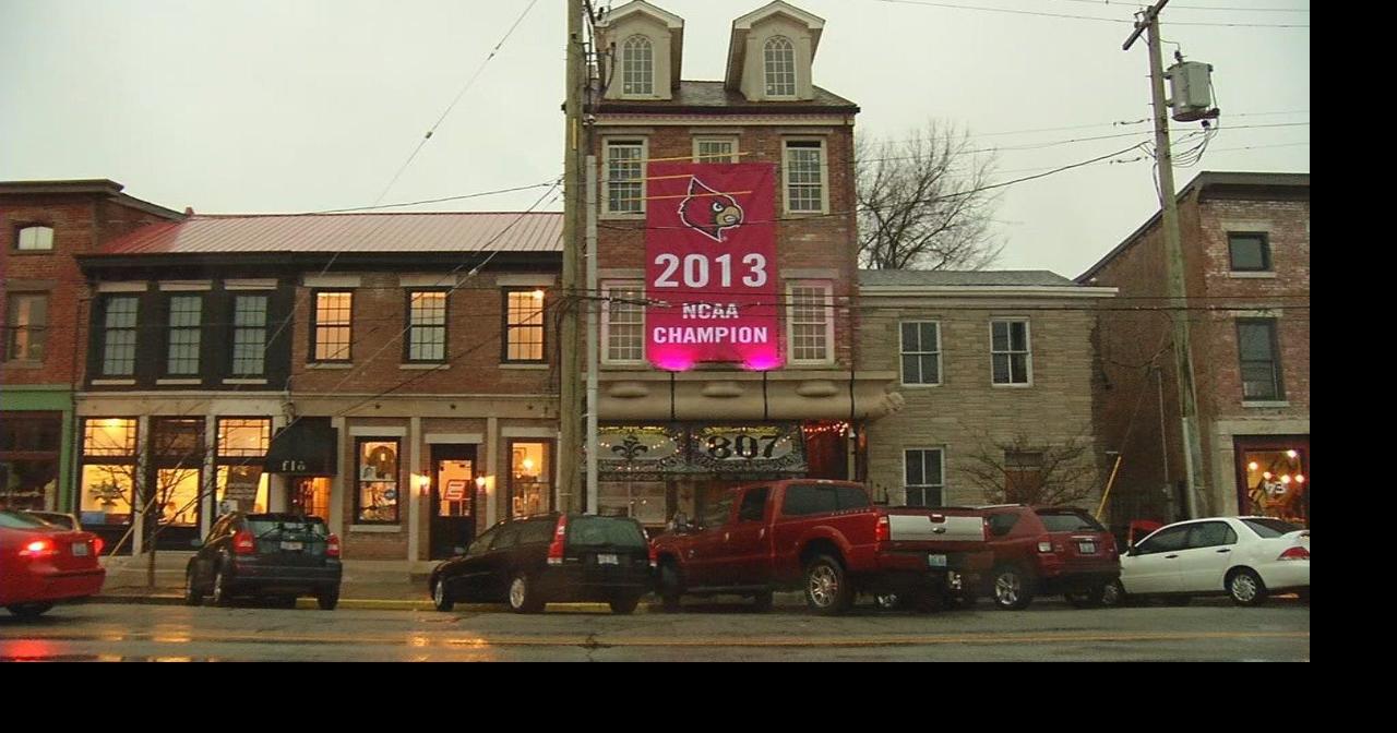 Replica of Louisville's 2013 national championship banner goes up
