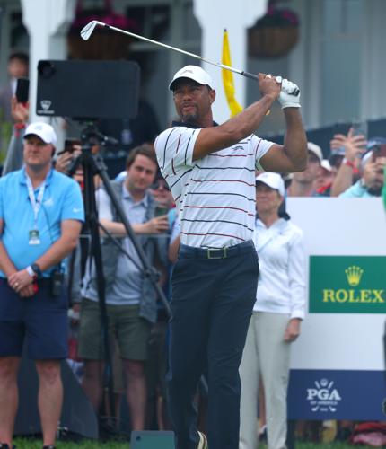 Tiger Woods connects on 13th tee box.JPG