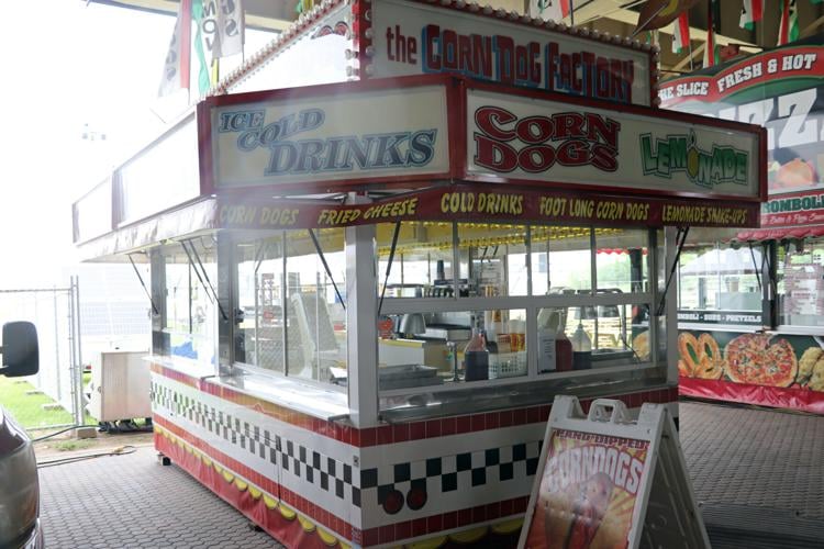 Crews set up booths along the Ohio River one day before Thunder Over Louisville 2023