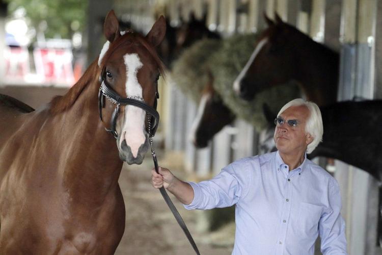 Bob Baffert walks Justify