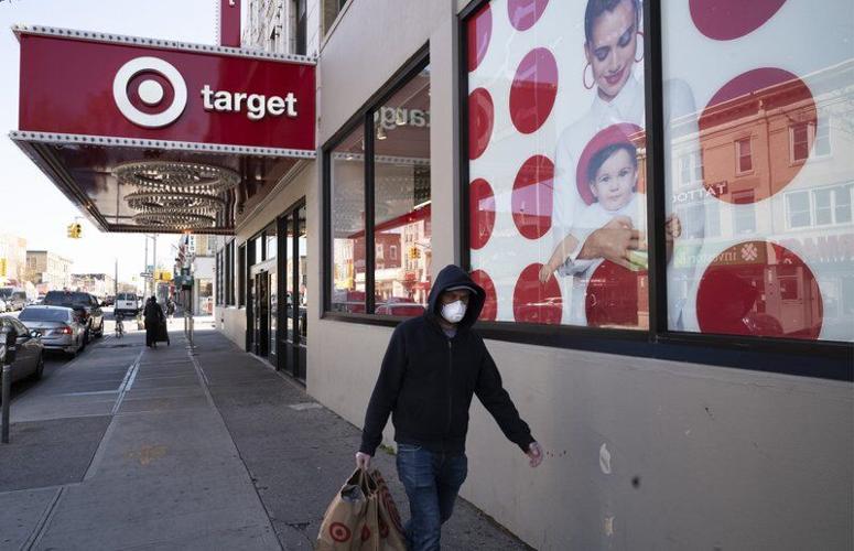 Shopper walks past Target store