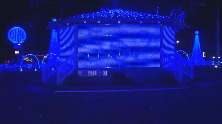 Charlestown Square lit blue for Officer TeJuan _T.J._ Johnson 2.jpeg