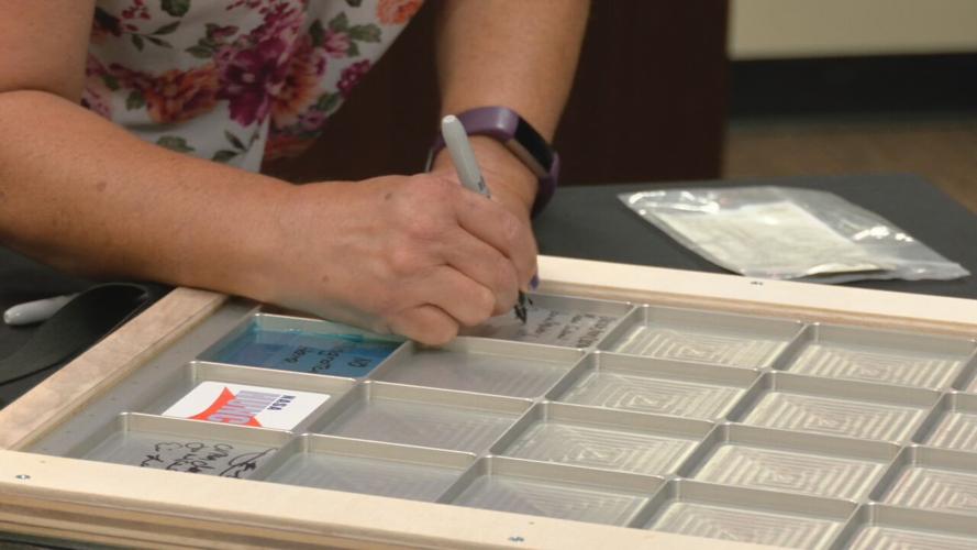 Chefs from the Sullivan University's culinary school signed a NASA locker that will be flown to the International Space Station