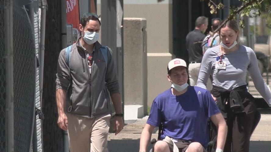 Group walks with masks in Louisville.jpeg