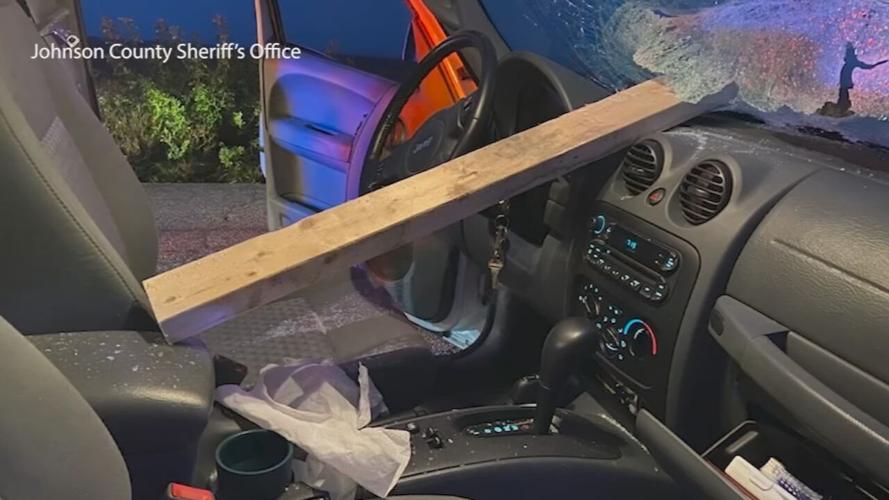 WOOD PLANK SMASHES THROUGH CAR WINDSHIELD.jpeg