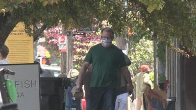 Man walks with mask in Louisville.jpeg