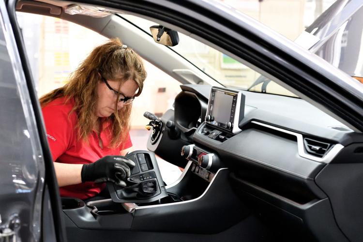 RAV4 Hybrid and Georgetown worker
