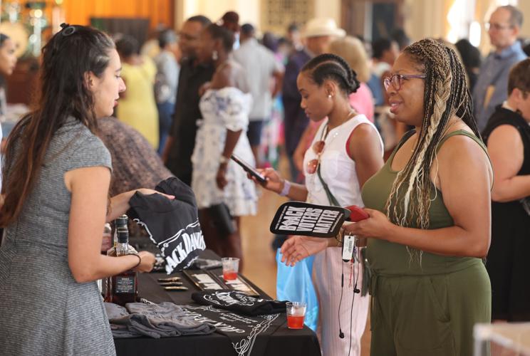 People look at vendors at Black Chef Showcase.JPG