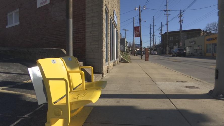 MORE GRAFFTI ON UL STADIUM BUS STOP SEATS 4VO.transfer_frame_0 seats.jpg