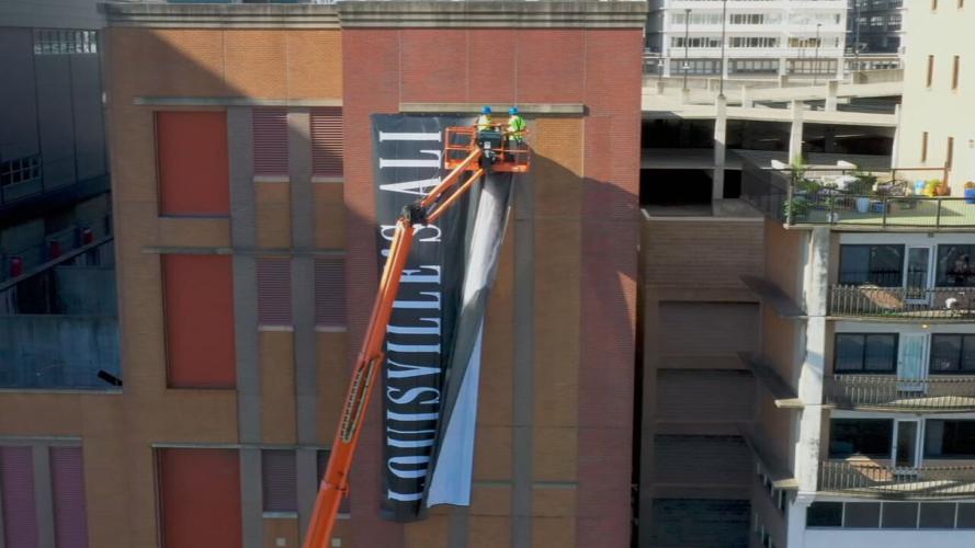 Newly refurbished Muhammad Ali banner hung on June 28, 2022 as part of Hometown Heroes campaign
