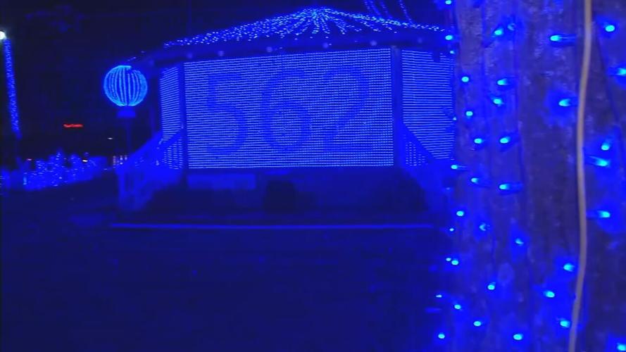 Charlestown Square lit blue for Ofc. TeJuan _T.J._ Johnson.jpeg