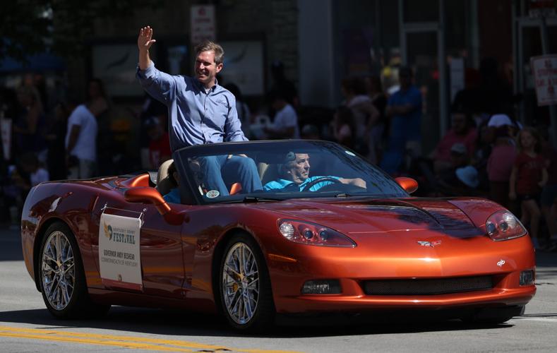 Gov. Andy Beshear waves at the Pegasus Parade