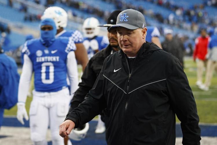 Kentucky head coach Mark Stoops walks off the field after losing to Vanderbilt.jpeg