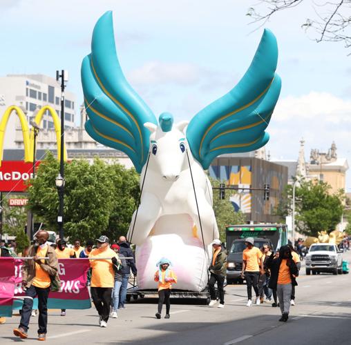 Pegasus blimp goes down Broadway.JPG