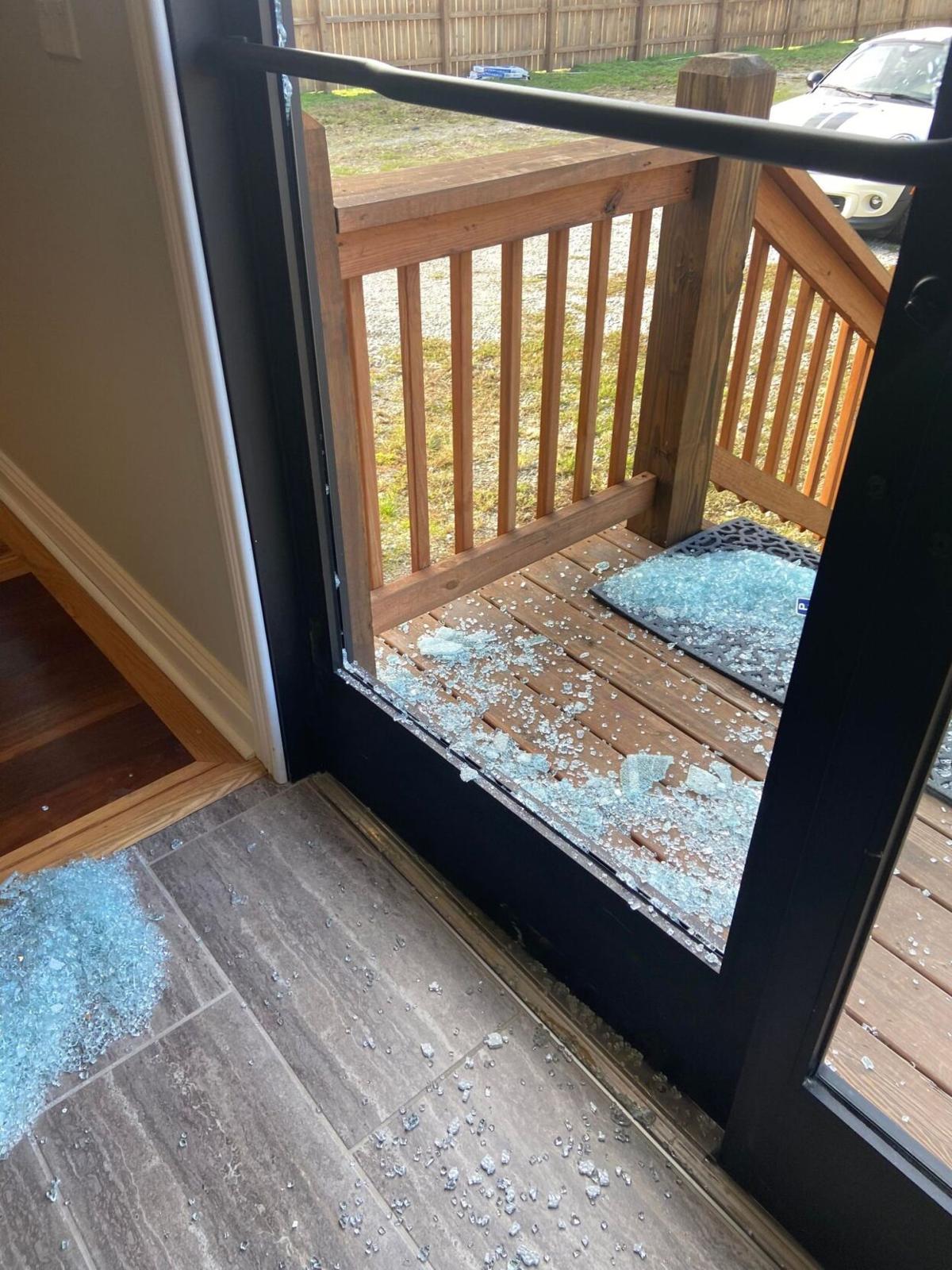 Highland Hardwood Flooring door smashed in