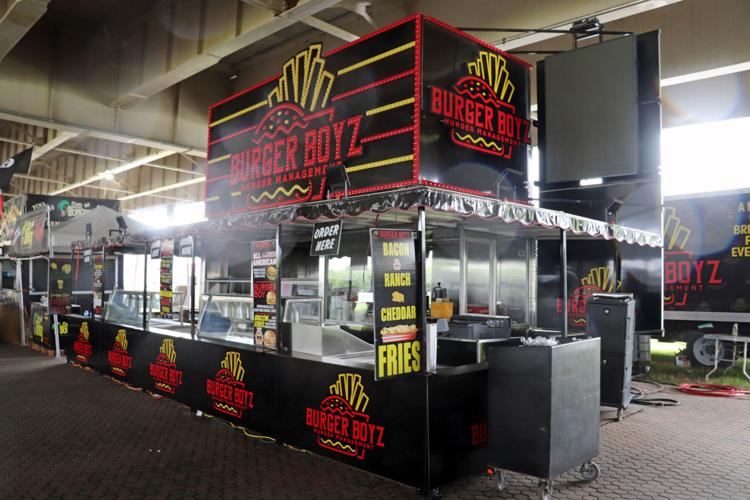 Crews set up booths along the Ohio River one day before Thunder Over Louisville 2023