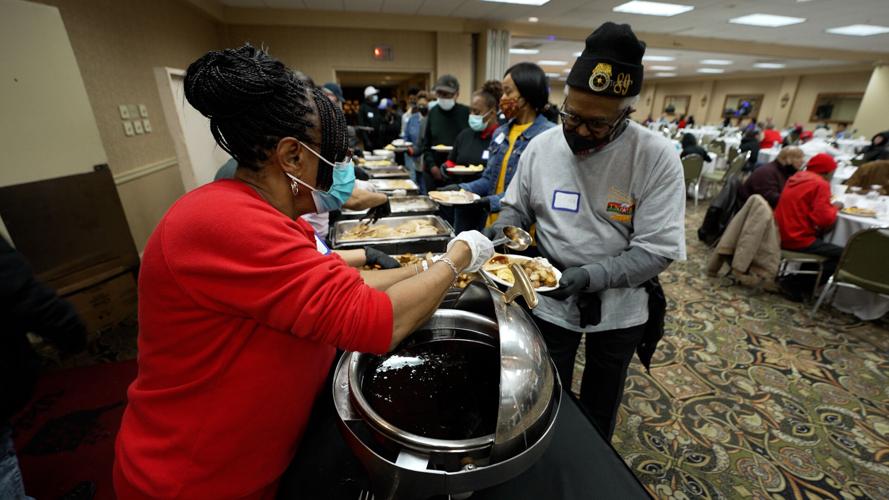 Volunteers serve Thanksgiving meals at Louisville's Wayside Christian Mission