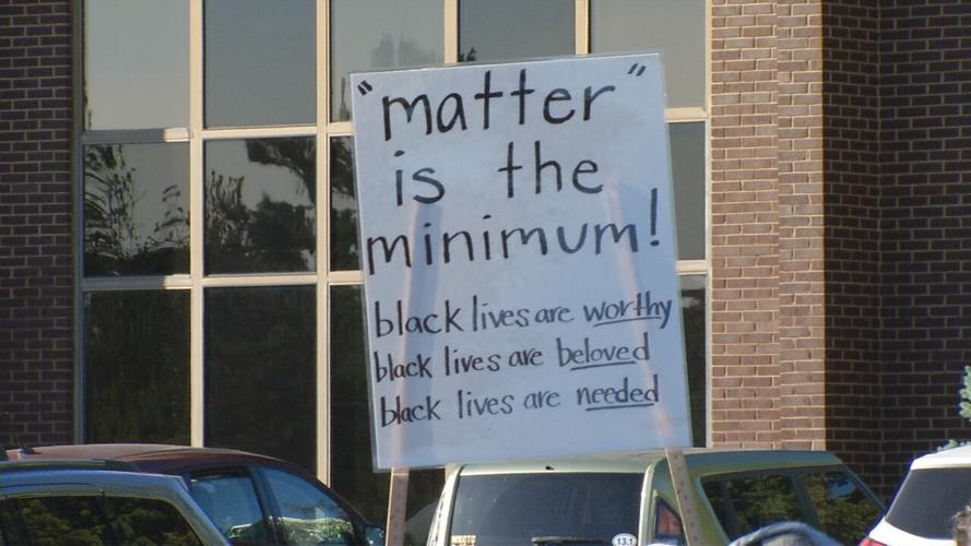 Sign at rally outside AG Daniel Cameron's office in Louisville 9/18/20