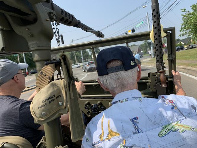 Louisville area World War II veterans take a ride on an antique military vehicle