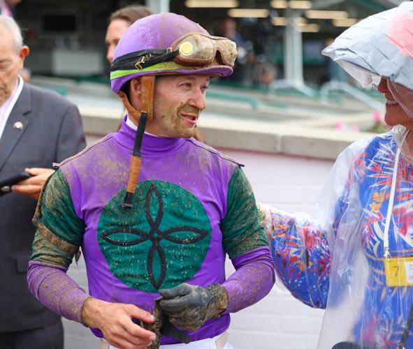 Jockey smiles after race on Oaks Day.JPG