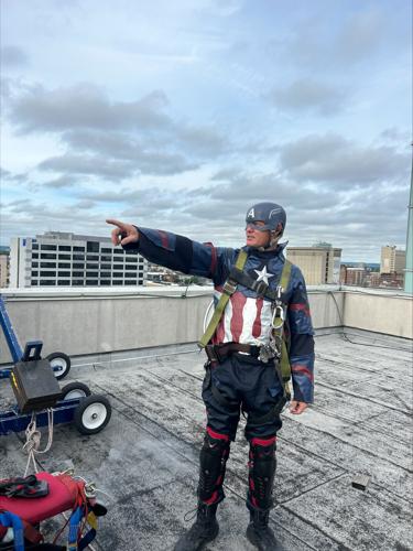 Window washers rappel from Norton Children's Hospital dressed as superheroes
