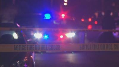 Police crime scene tape at night (generic)