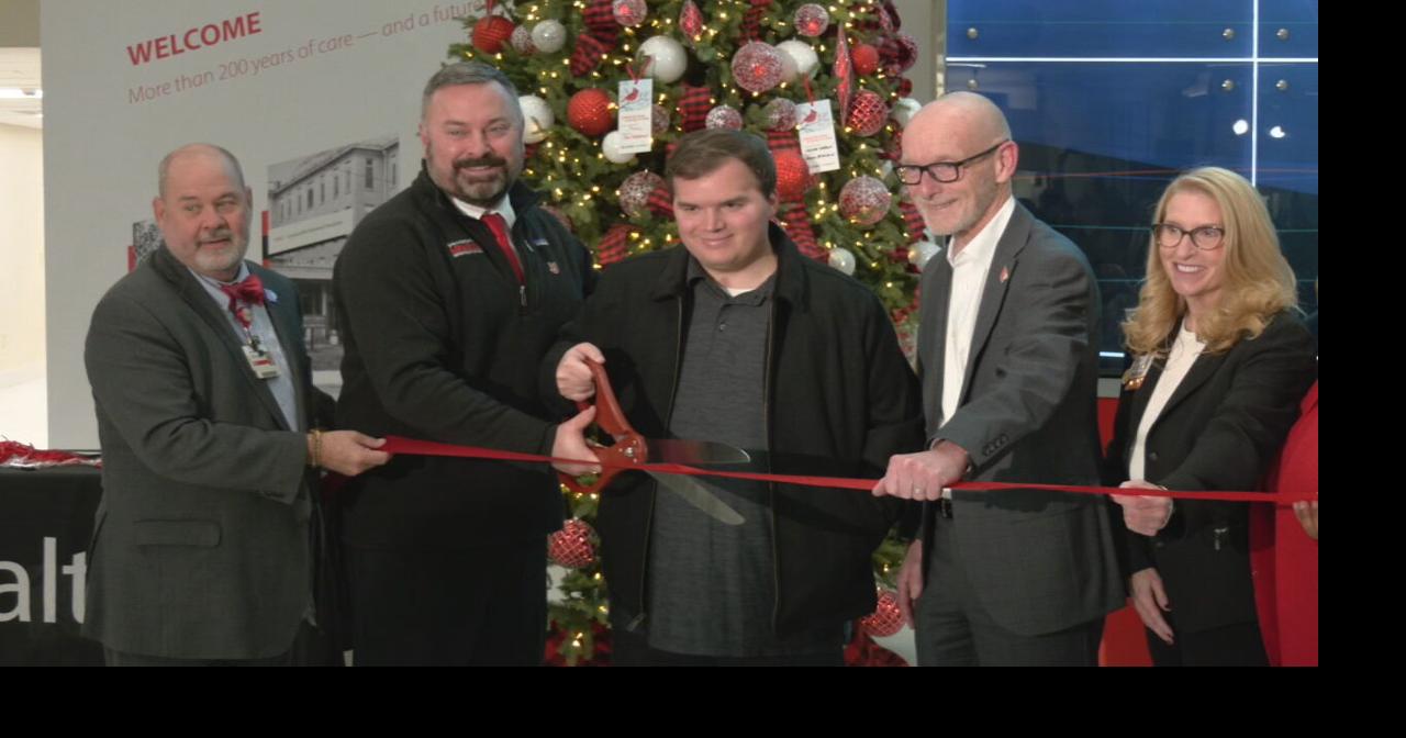 Nick Wilt helps cut the ribbon on UofL Hospital's West Tower expansion