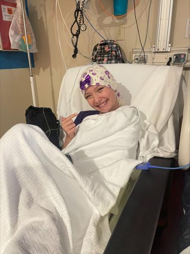 Alexis Bibb smiles in hospital bed