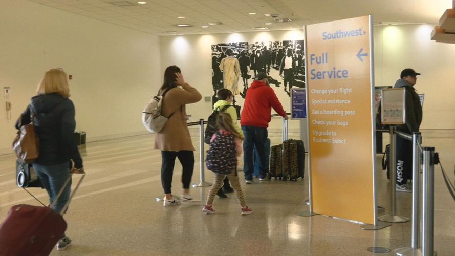 Travelers at the Louisville Muhammad Ali International Airport