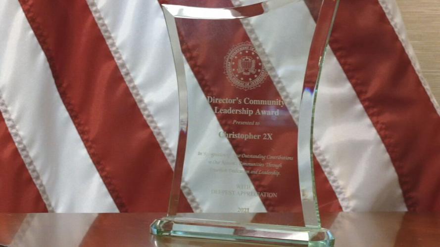 Christopher 2X Receives FBI Award