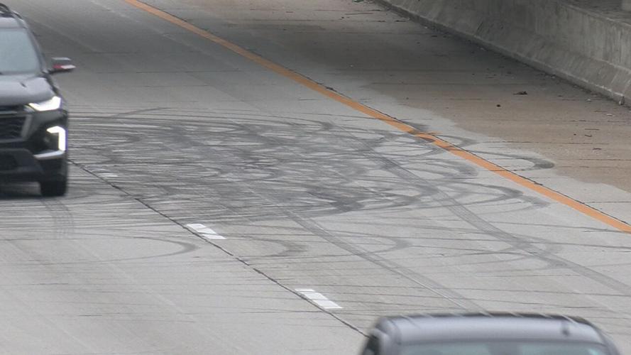 Black rubber tire marks on I-264 near Muhammad Ali International Airport