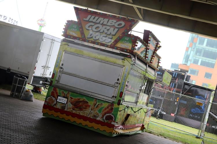 Crews set up booths along the Ohio River one day before Thunder Over Louisville 2023